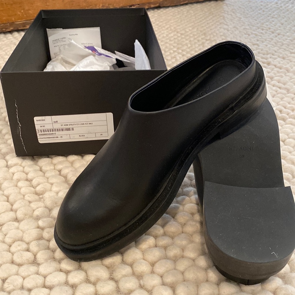 Woman’s black mule. Compare to jenni kayne
